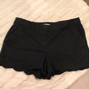 black scalloped shorts